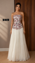 Front view of mauve and ivory strapless appliqué evening gown with pleated tulle skirt