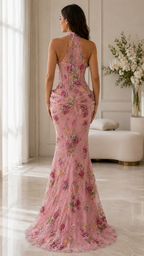Back view of blush pink floral embellished mermaid gown with halter neckline and soft train