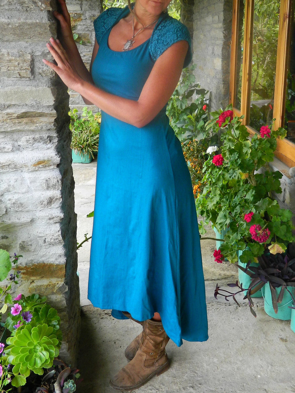 Asymmetric Midi Dress with Cutout Cape and Patchwork Detail