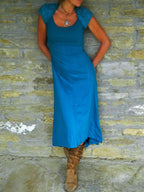 Asymmetric Midi Dress with Cutout Cape and Patchwork Detail